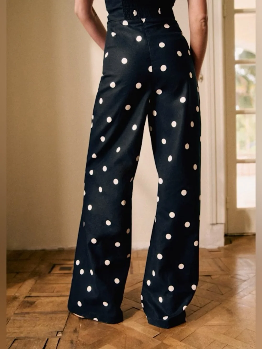 Sezane Editions Stella polka dot strapless trouser jumpsuit